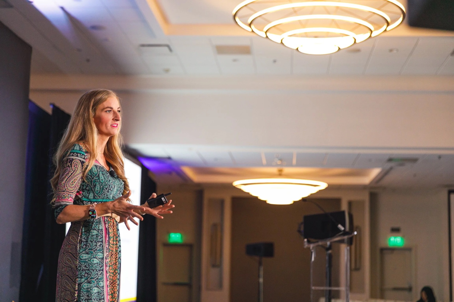 Alison Curfman, MD, speaking on stage